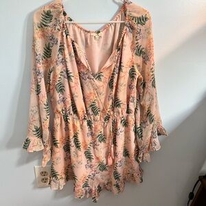 Floral and palm long sleeve romper in size medium